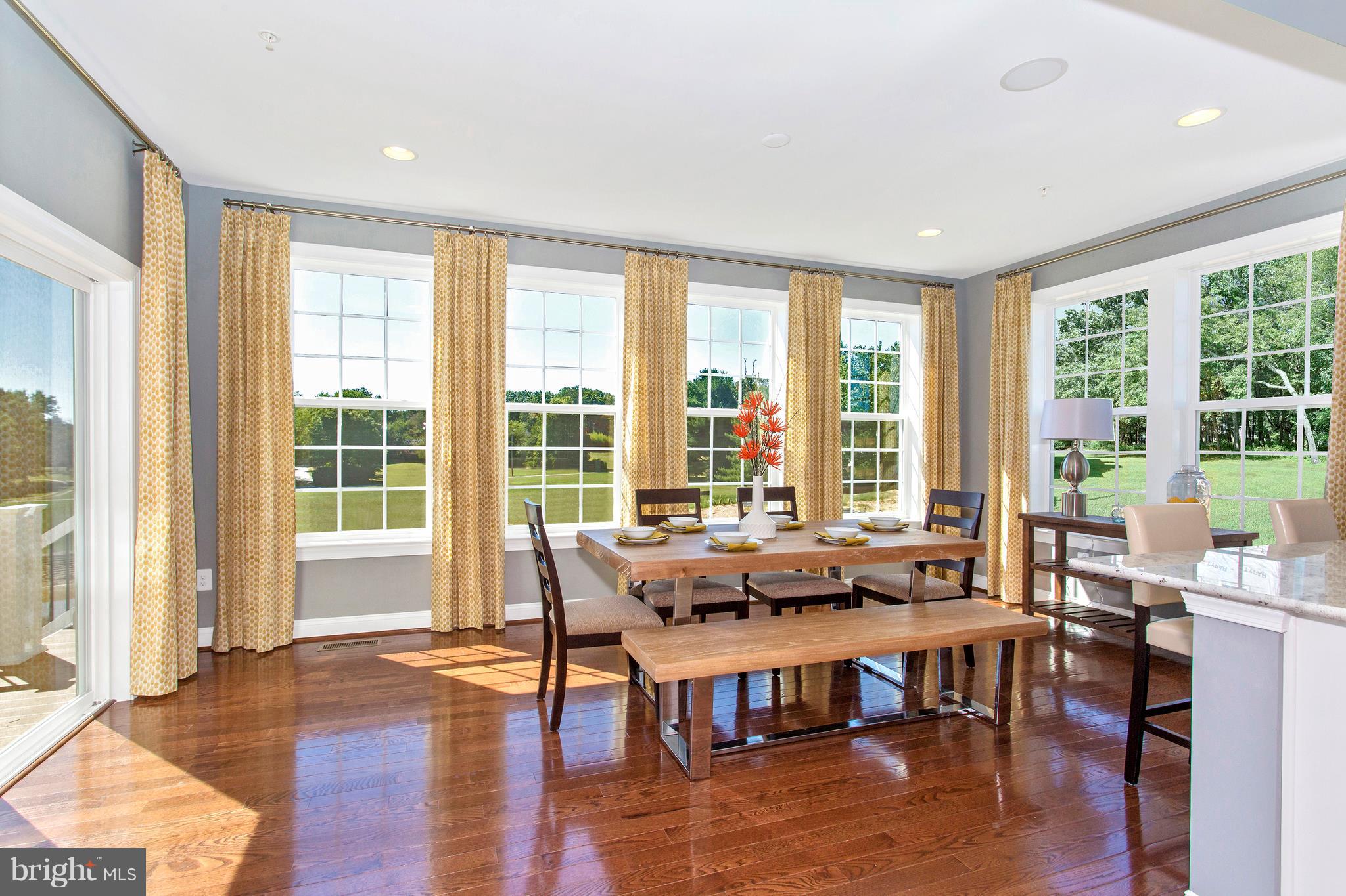 2112 Gable Drive Jessup, MD 20794 - Photo 8 of 27 a living room with furniture and floor to ceiling windows