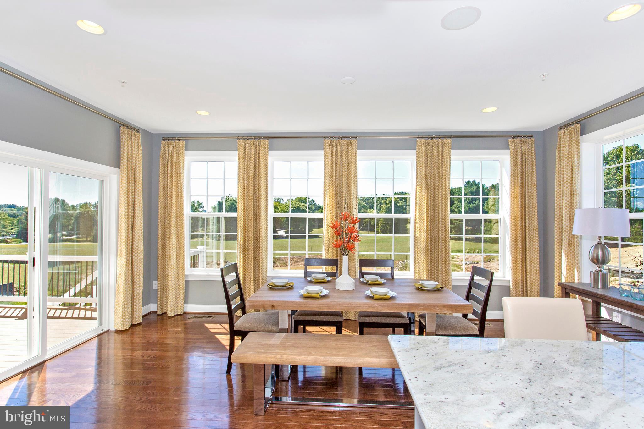 2112 Gable Drive Jessup, MD 20794 - Photo 9 of 27 a living room with furniture and floor to ceiling windows