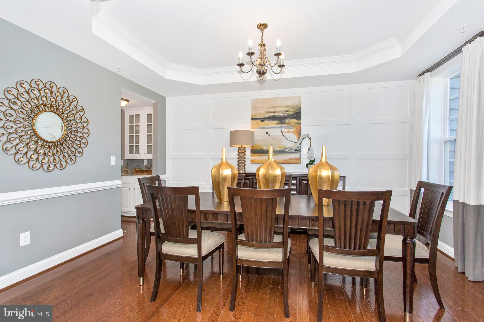 2112 Gable Drive Jessup, MD 20794 - Photo 10 of 27 a view of a dining room with furniture and wooden floor