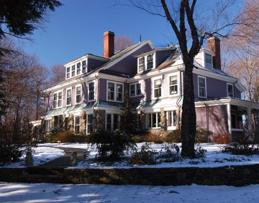 6 Alwyngton Road Brookline, MA 02467 - Photo 1 of 1 a front view of a building with street view and trees