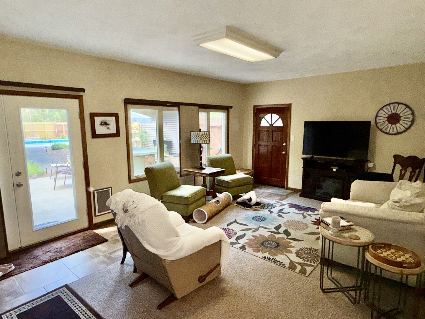 956 Country Club Road Metropolis, IL 62960 - Photo 25 of 48 a living room with furniture a flat screen tv and a window