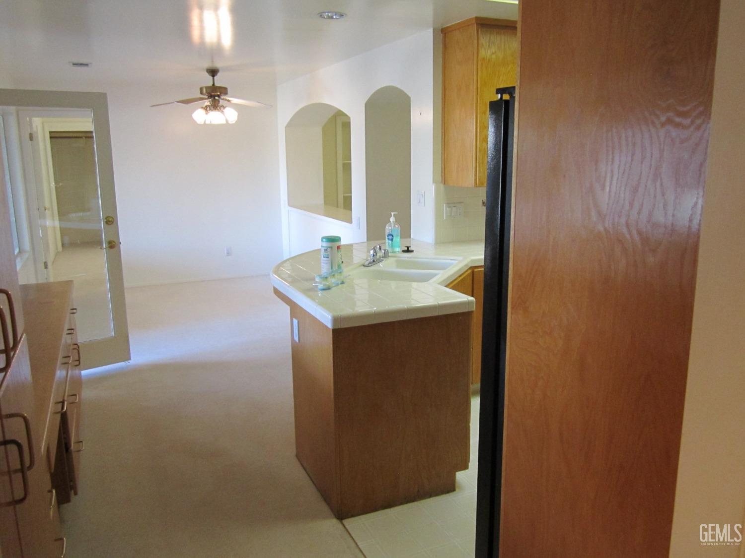 Undisclosed Address Bakersfield, CA 93314 - Photo 15 of 34 a bathroom with a sink and a mirror