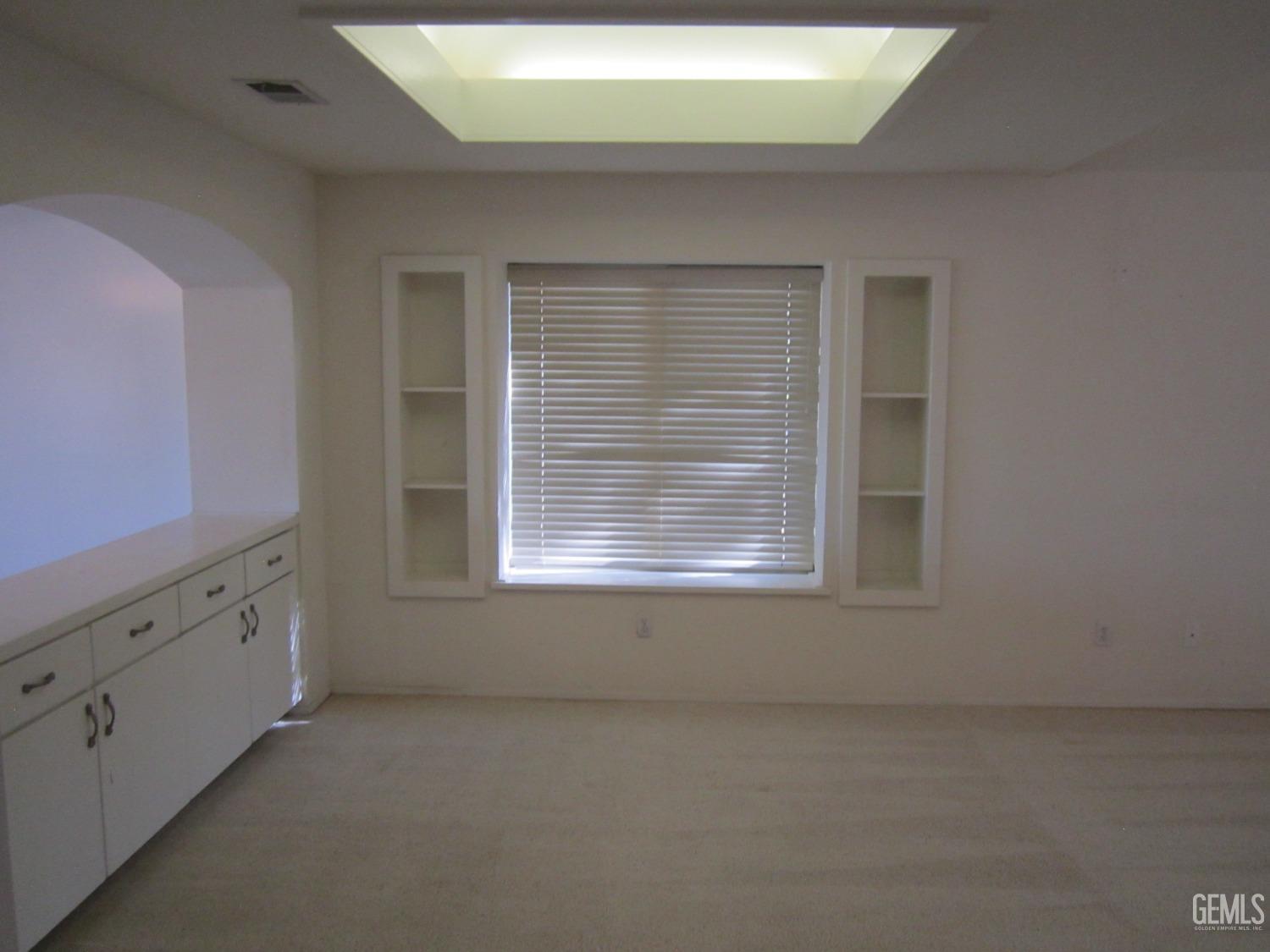 Undisclosed Address Bakersfield, CA 93314 - Photo 18 of 34 a view of an empty room with a window