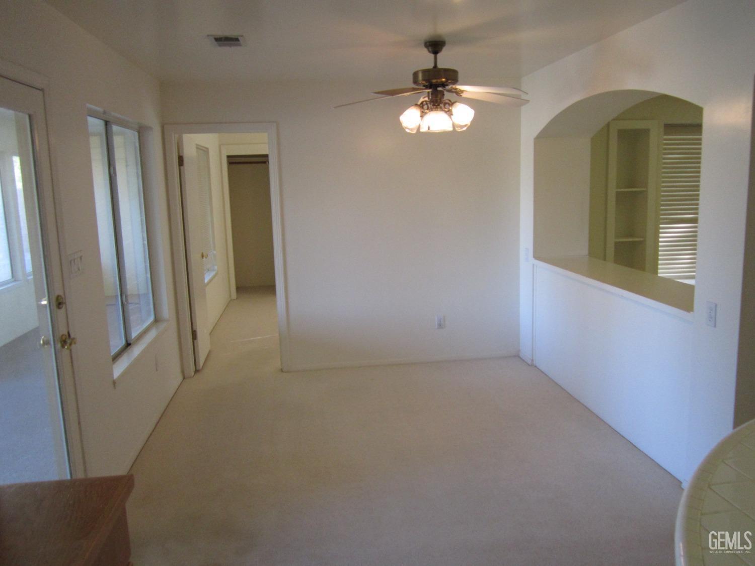 Undisclosed Address Bakersfield, CA 93314 - Photo 20 of 34 a view of a livingroom with a chandelier