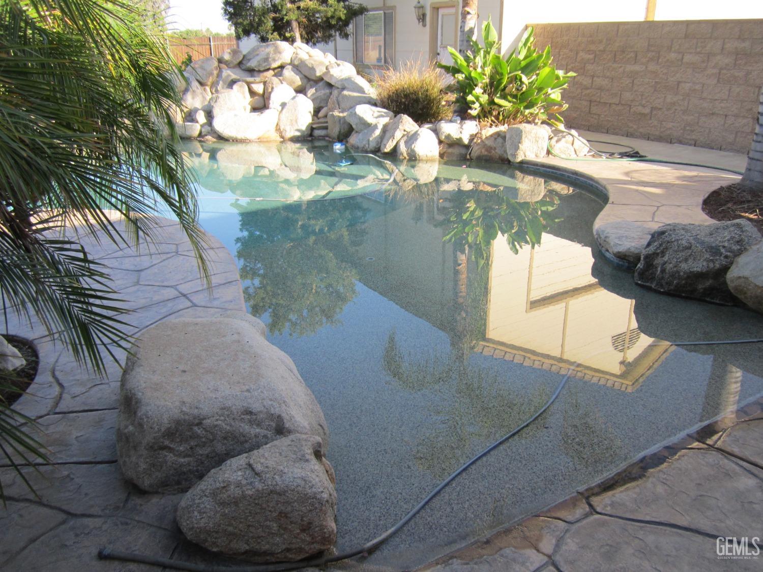 Undisclosed Address Bakersfield, CA 93314 - Photo 25 of 34 a view of a vase of flowers sitting on a table