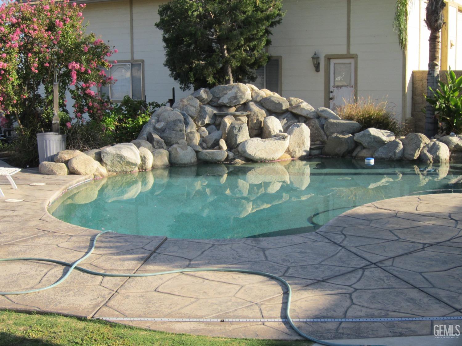 Undisclosed Address Bakersfield, CA 93314 - Photo 28 of 34 a view of a backyard with sitting area