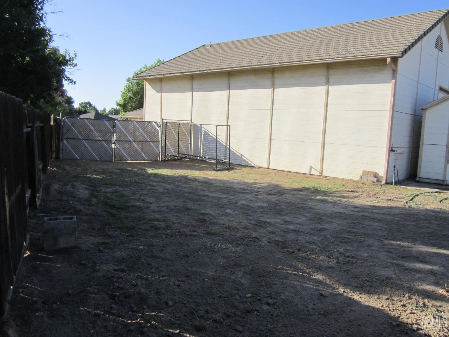 Undisclosed Address Bakersfield, CA 93314 - Photo 32 of 34 a view of a backyard of the house