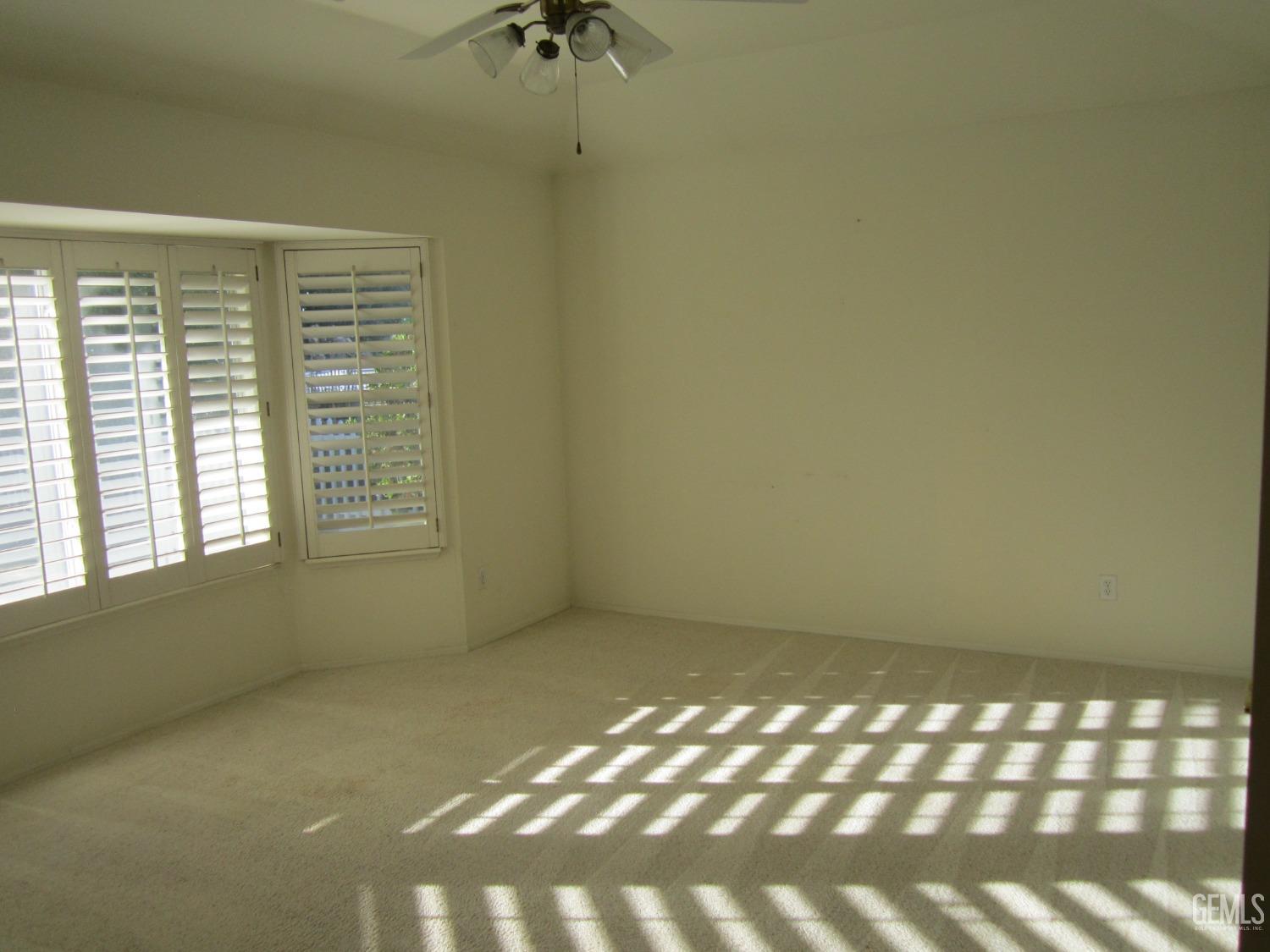 Undisclosed Address Bakersfield, CA 93314 - Photo 4 of 34 a view of an empty room with a window