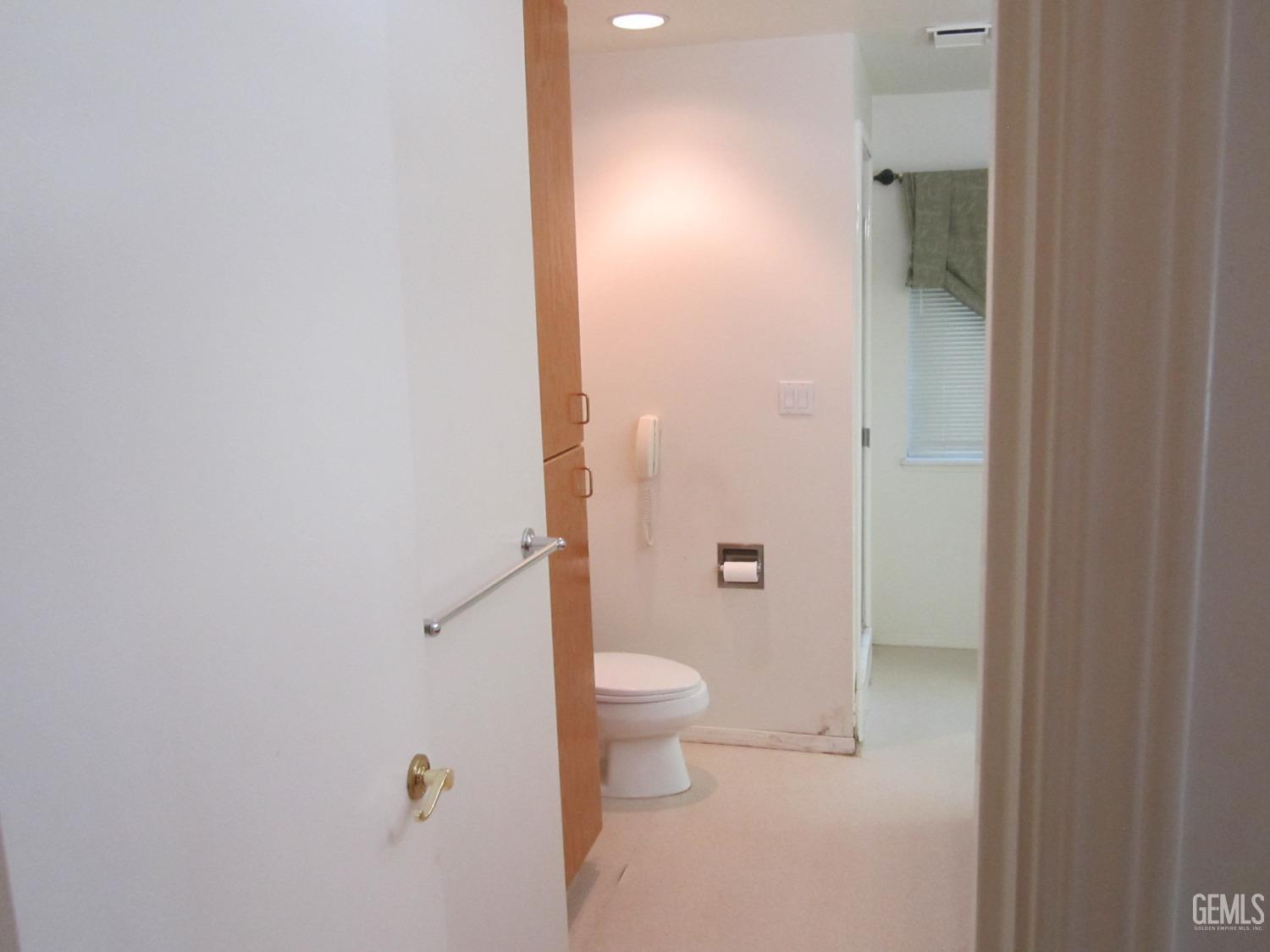 Undisclosed Address Bakersfield, CA 93314 - Photo 9 of 34 a bathroom with a granite countertop sink