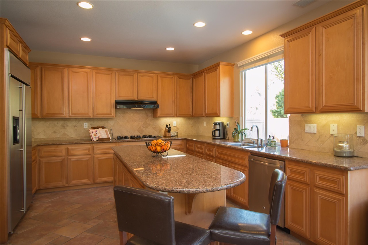 1243 Mariposa Road Carlsbad, CA 92011 - Photo 12 of 25 The kitchen has plenty of counter and cabinet space, perfect for the chef in the family!