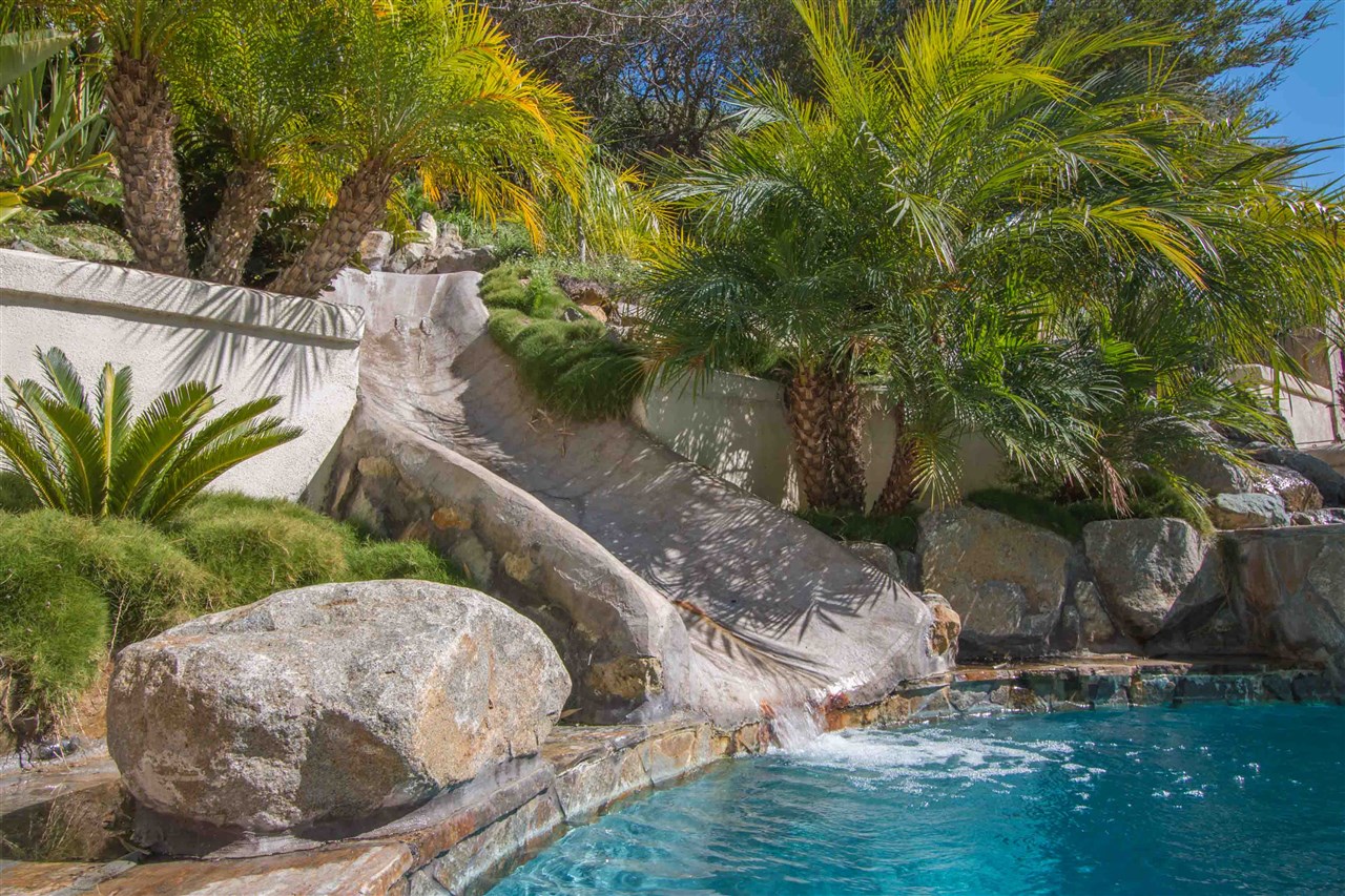 1243 Mariposa Road Carlsbad, CA 92011 - Photo 24 of 25 Unique built-in slide provides much entertainment!