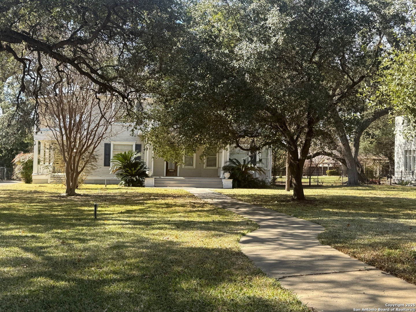 415 North Park Street Uvalde, TX 78801 - Photo 1 of 12 a view of a house with a yard