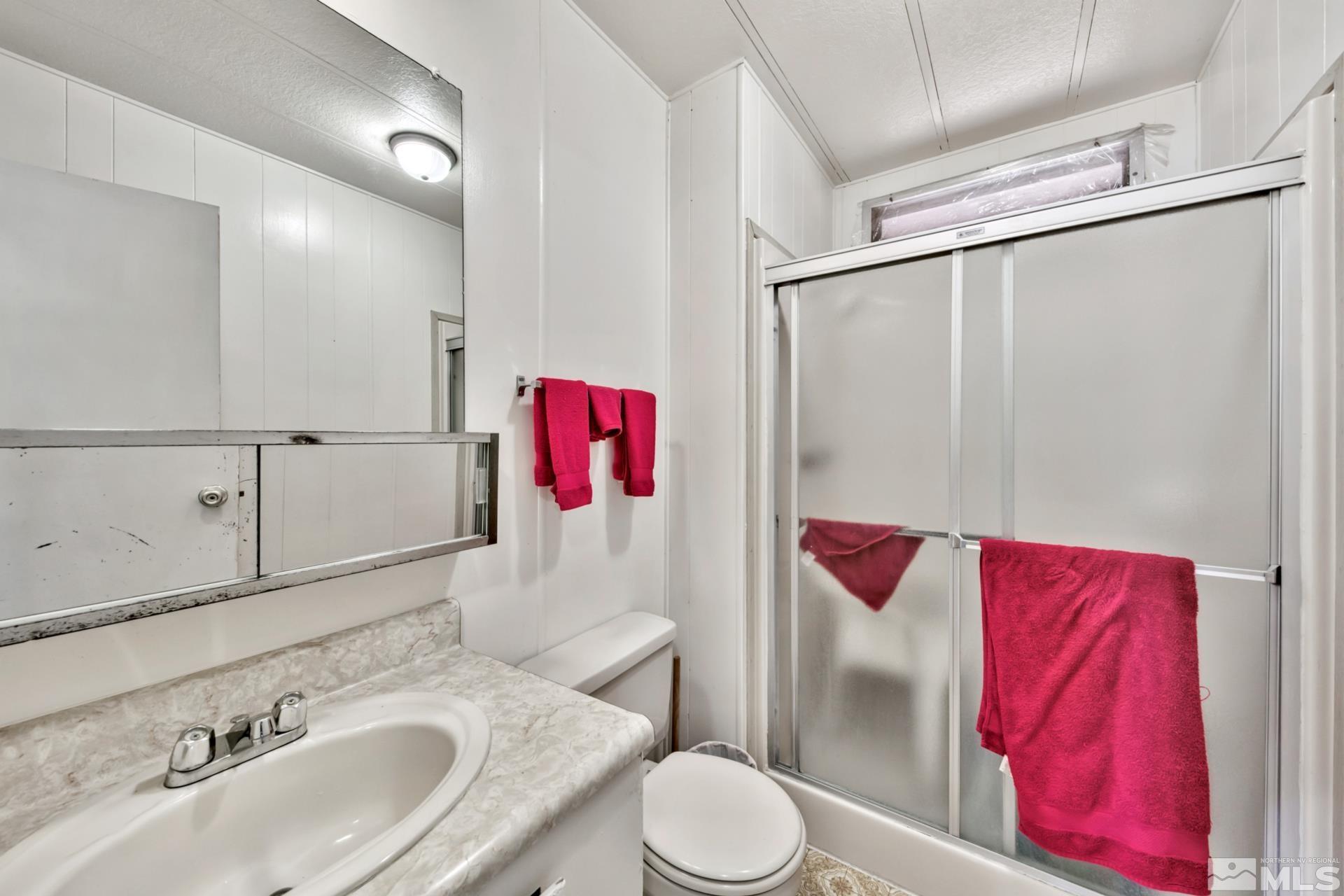 167 Crescent Drive Stateline, NV 89449 - Photo 17 of 23 a bathroom with a sink toilet and shower
