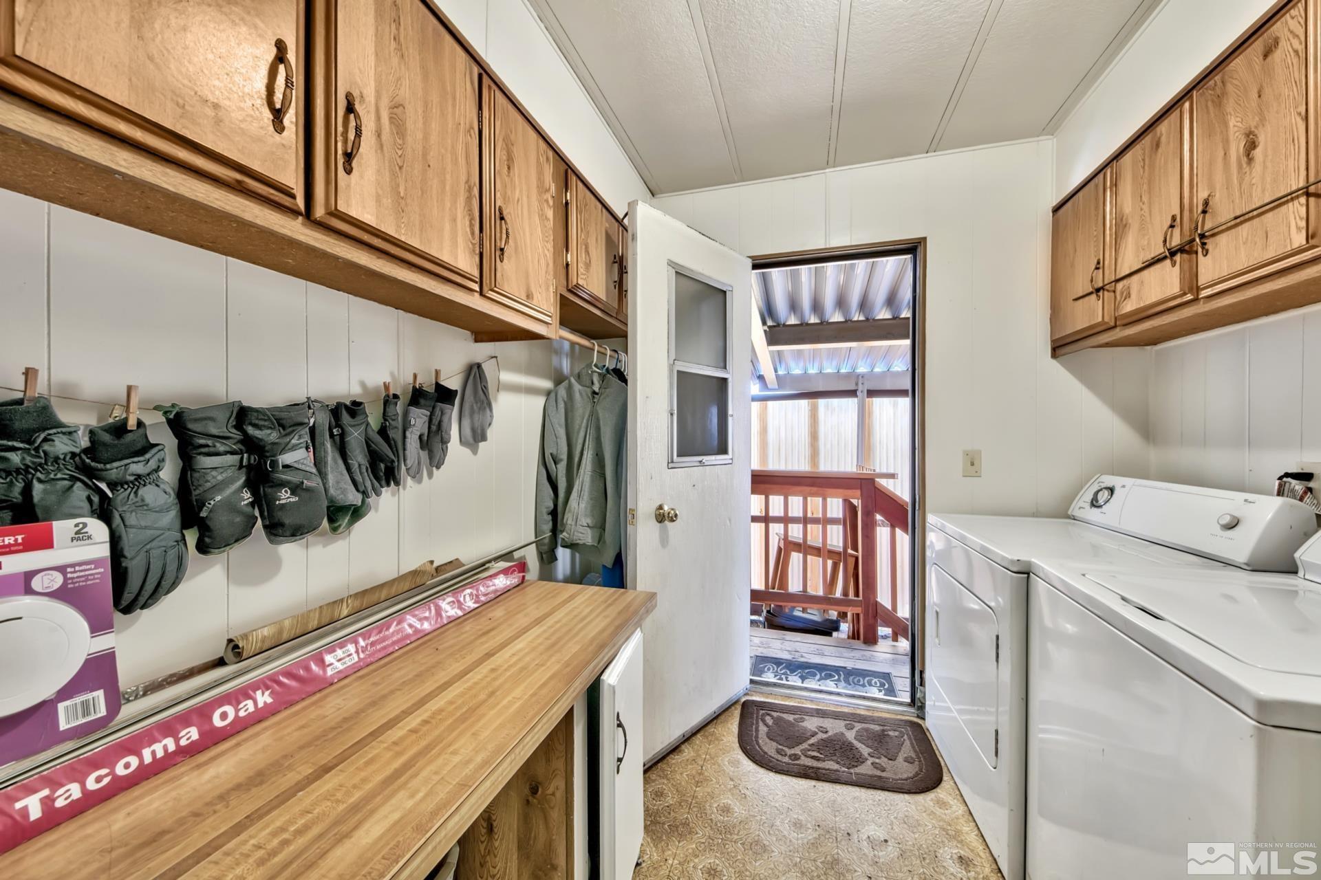 167 Crescent Drive Stateline, NV 89449 - Photo 22 of 23 a utility room with dryer and washer