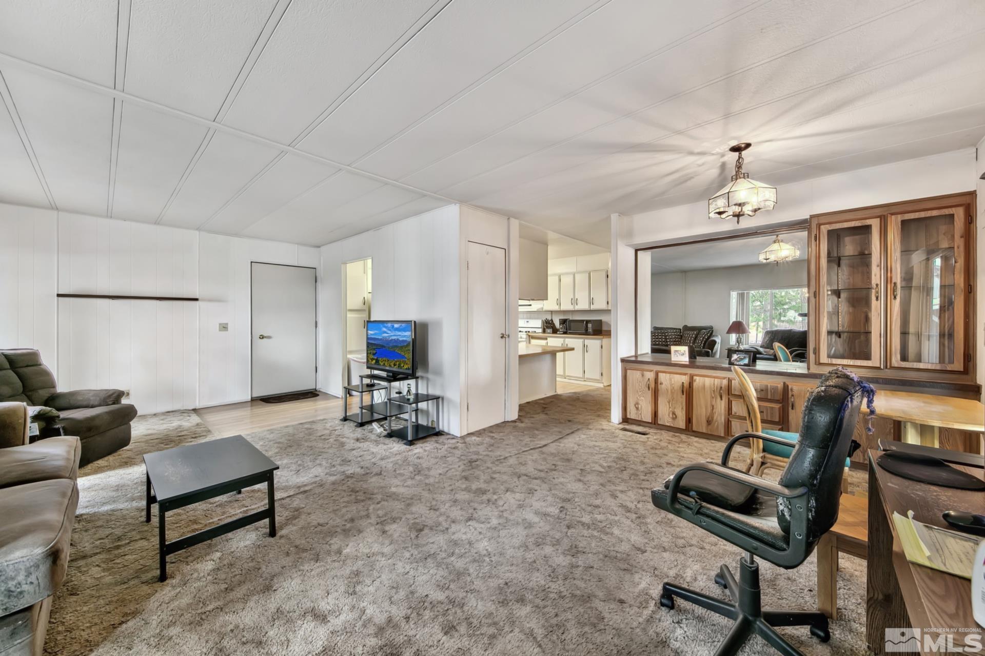 167 Crescent Drive Stateline, NV 89449 - Photo 8 of 23 a living room with furniture and kitchen view
