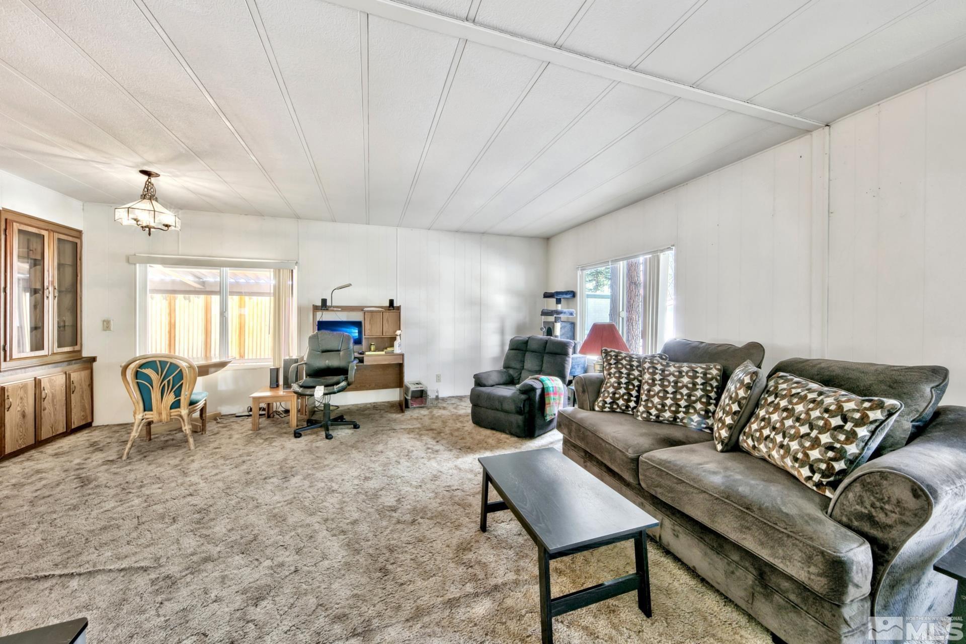 167 Crescent Drive Stateline, NV 89449 - Photo 10 of 23 a living room with furniture and a couch