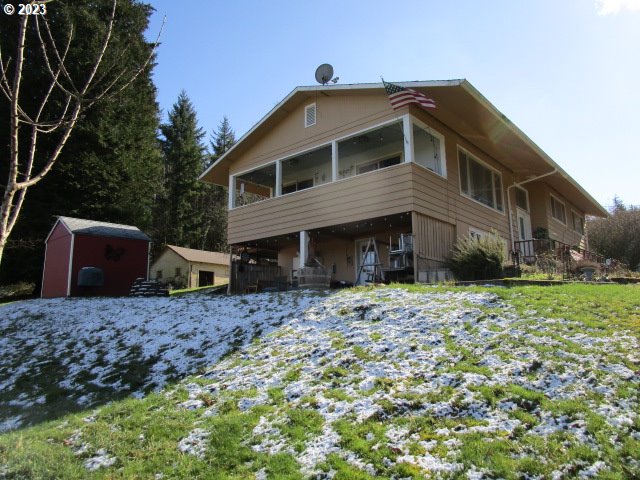 80452 Alston Mayger Road Clatskanie, OR 97016 - Photo 11 of 28 a front view of a house with a yard