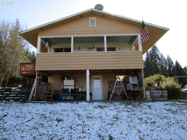 80452 Alston Mayger Road Clatskanie, OR 97016 - Photo 12 of 28 a front view of a house with garden