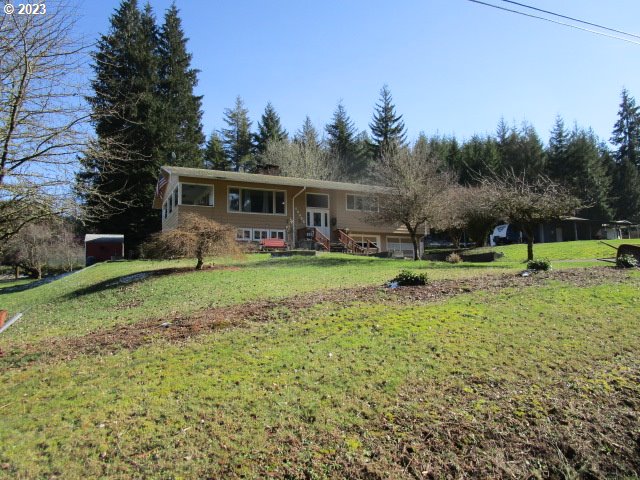 80452 Alston Mayger Road Clatskanie, OR 97016 - Photo 3 of 28 a view of a house with backyard