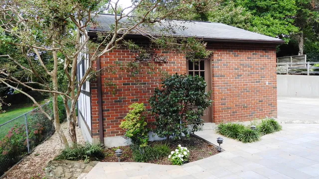 a view of a back yard of the house