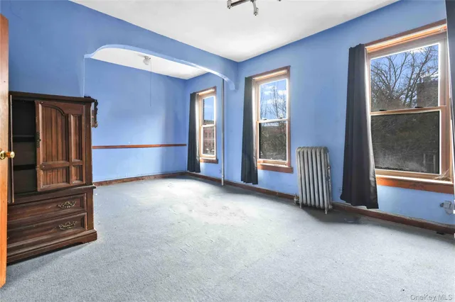 a view of empty room with windows