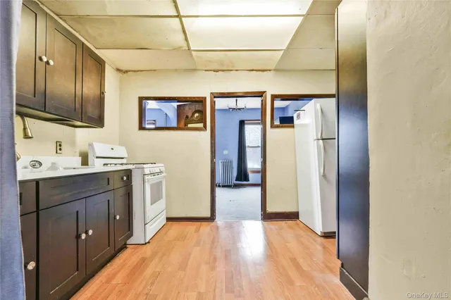 a spacious bathroom with a sink and a mirror