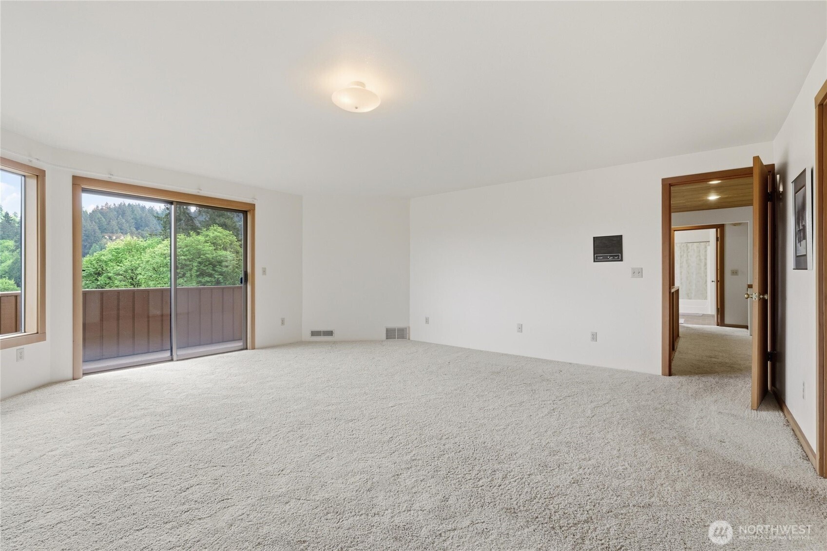 9520 Odin Way Bothell, WA 98011 - Photo 16 of 40 a view of an empty room with a window