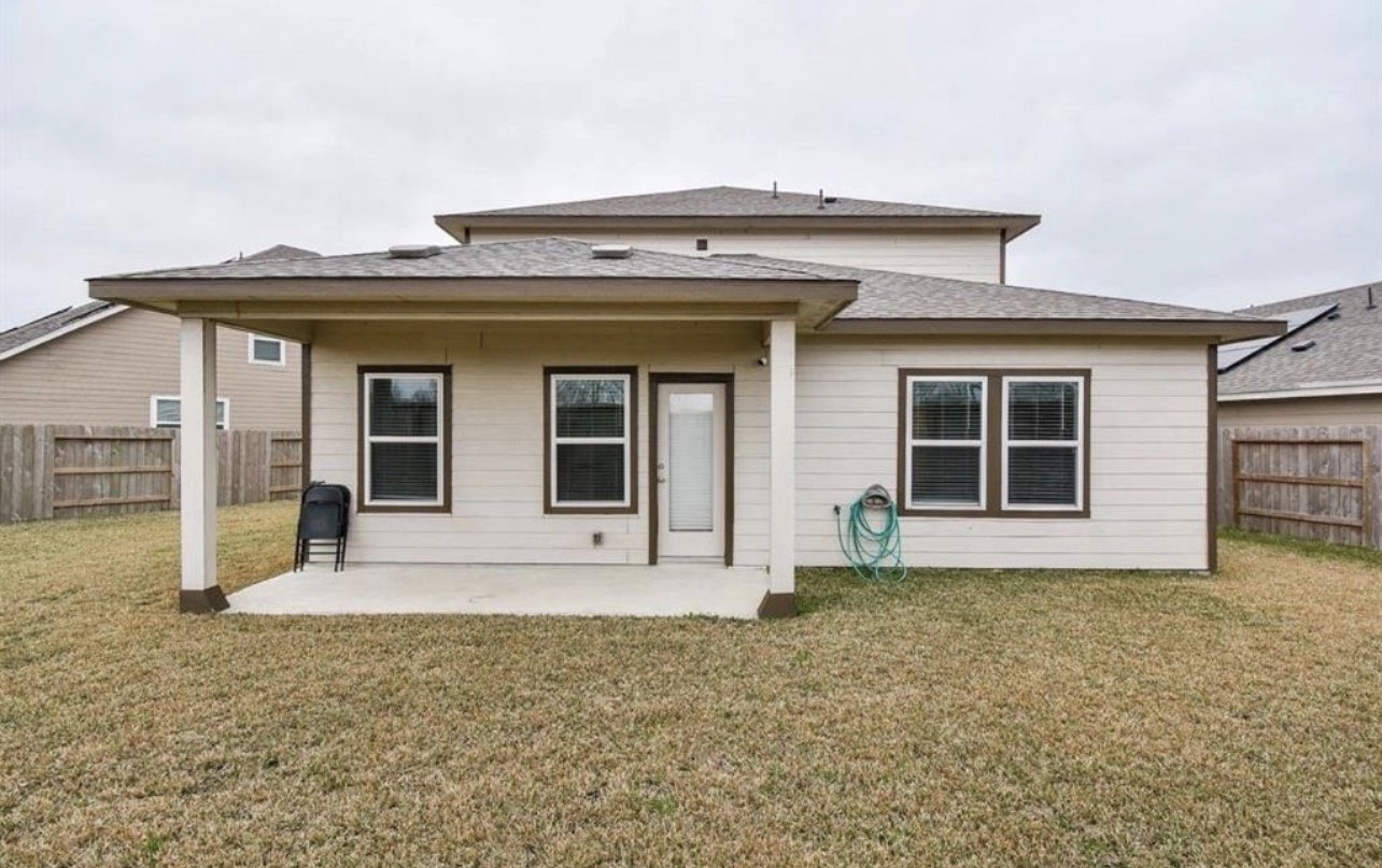 6927 Ventura Drive Rosharon, TX 77583 - Photo 23 of 24 a front view of a house with garden
