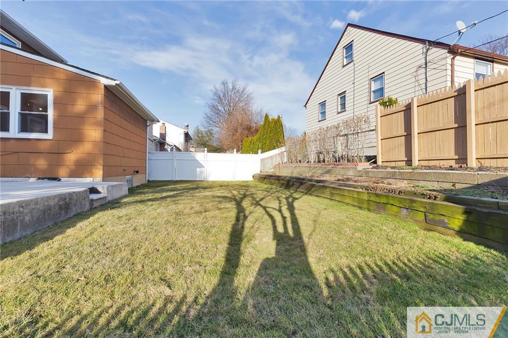 1591 Ridgeway Street Union, NJ 07083 - Photo 23 of 24 a swimming pool with outdoor seating and yard