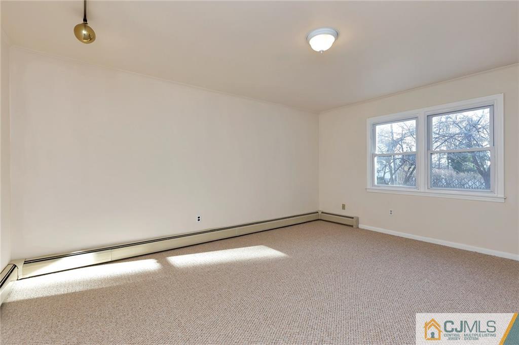 1591 Ridgeway Street Union, NJ 07083 - Photo 6 of 24 an empty room with windows