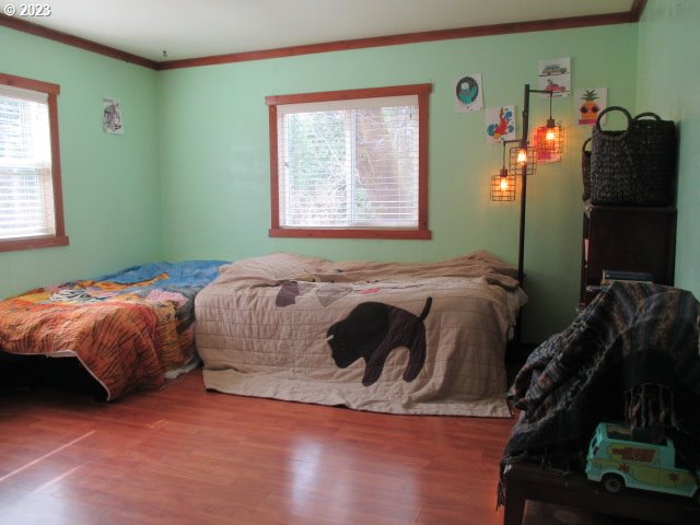 41380 Southwest Fort Hill Road Willamina, OR 97396 - Photo 19 of 31 a bedroom with a bed and a window
