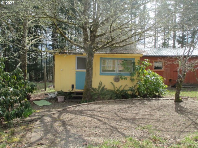 41380 Southwest Fort Hill Road Willamina, OR 97396 - Photo 6 of 31 a front view of a house with a yard