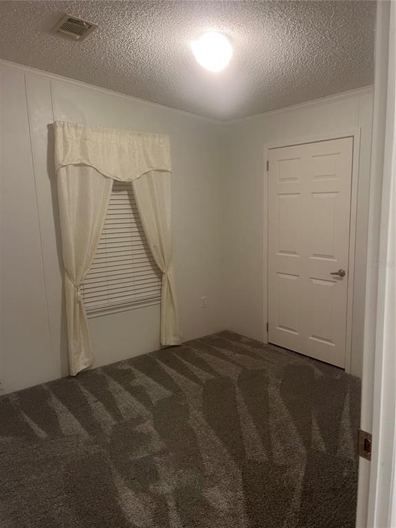 4064 Southwest 9th Way Okeechobee, FL 34974 - Photo 15 of 16 a view of an empty room