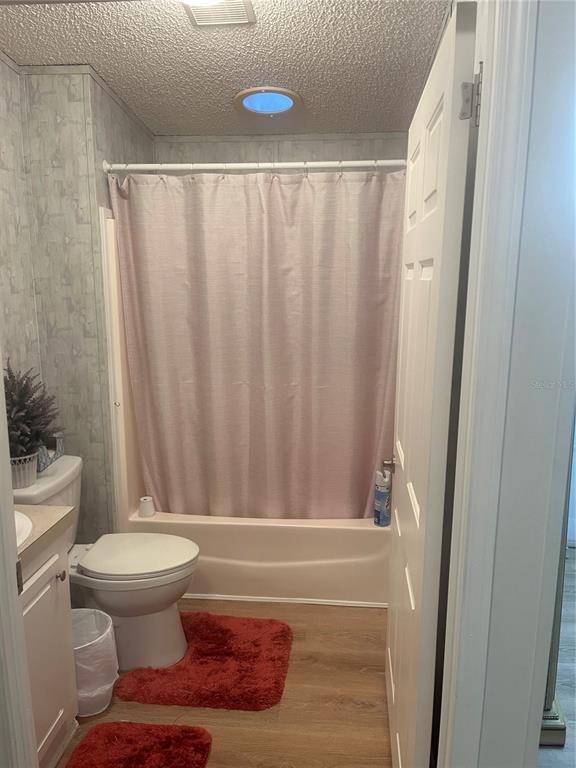 4064 Southwest 9th Way Okeechobee, FL 34974 - Photo 16 of 16 a bathroom with a toilet and a shower