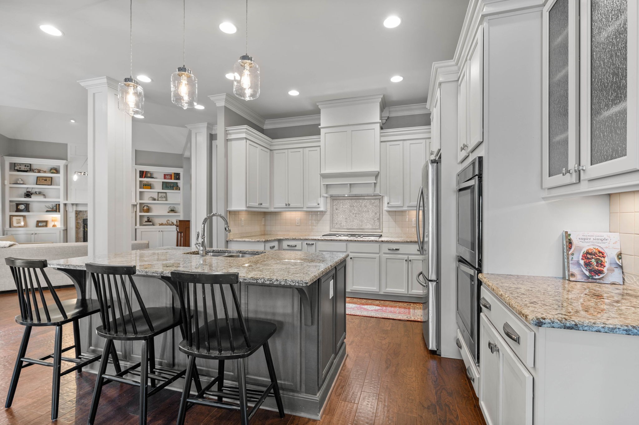 312 Cedar Street Lebanon, TN 37087 - Photo 11 of 69 a kitchen with a table chairs refrigerator and cabinets