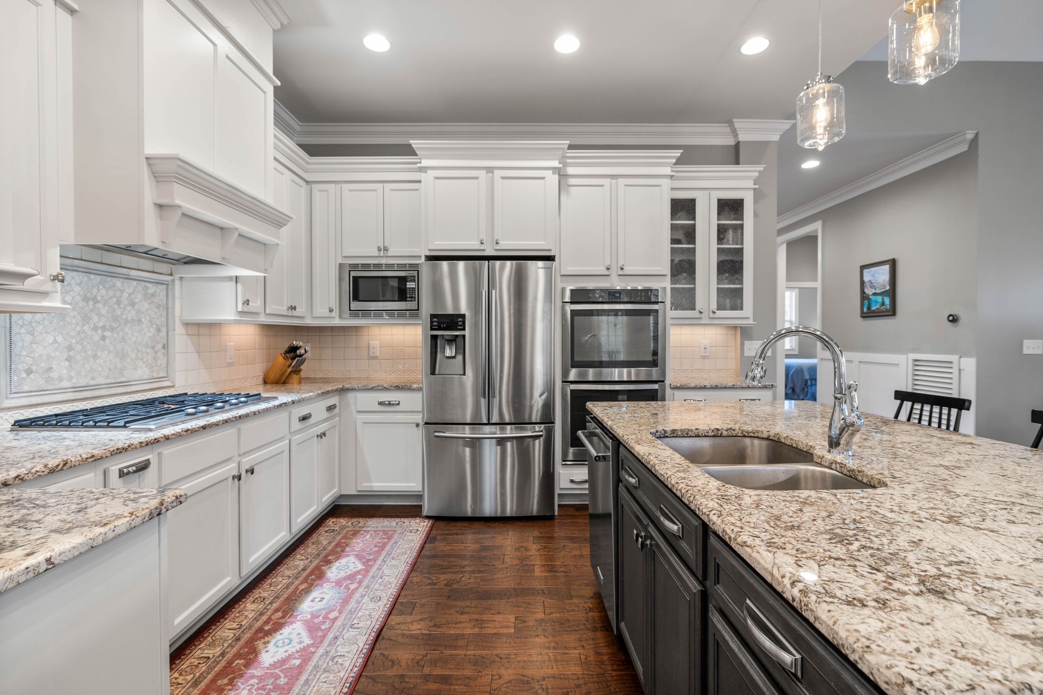 312 Cedar Street Lebanon, TN 37087 - Photo 13 of 69 a kitchen with stainless steel appliances granite countertop a sink stove and refrigerator