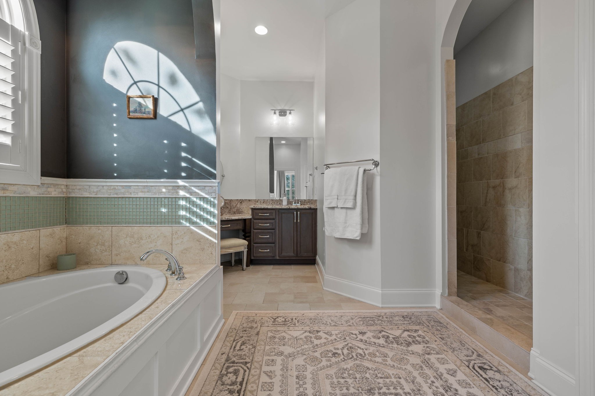312 Cedar Street Lebanon, TN 37087 - Photo 25 of 69 a bathroom with a bathtub a shower and mirror
