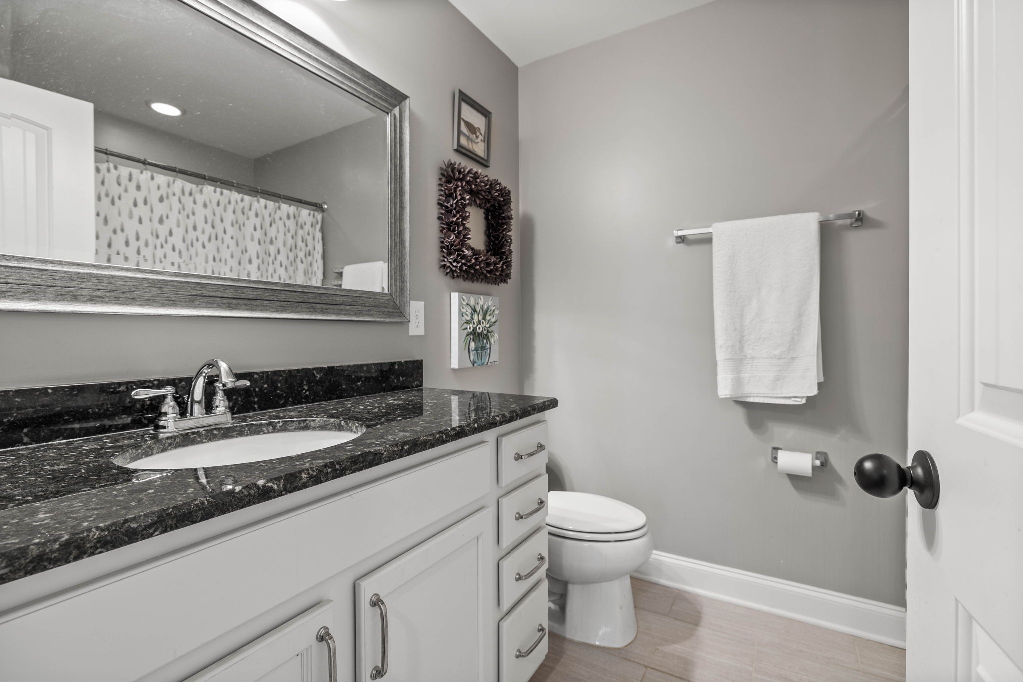 312 Cedar Street Lebanon, TN 37087 - Photo 35 of 69 a bathroom with a granite countertop sink toilet and mirror