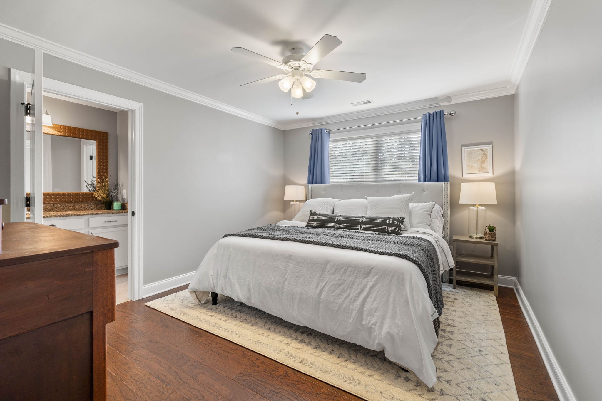 312 Cedar Street Lebanon, TN 37087 - Photo 36 of 69 a bedroom with a large bed and a ceiling fan