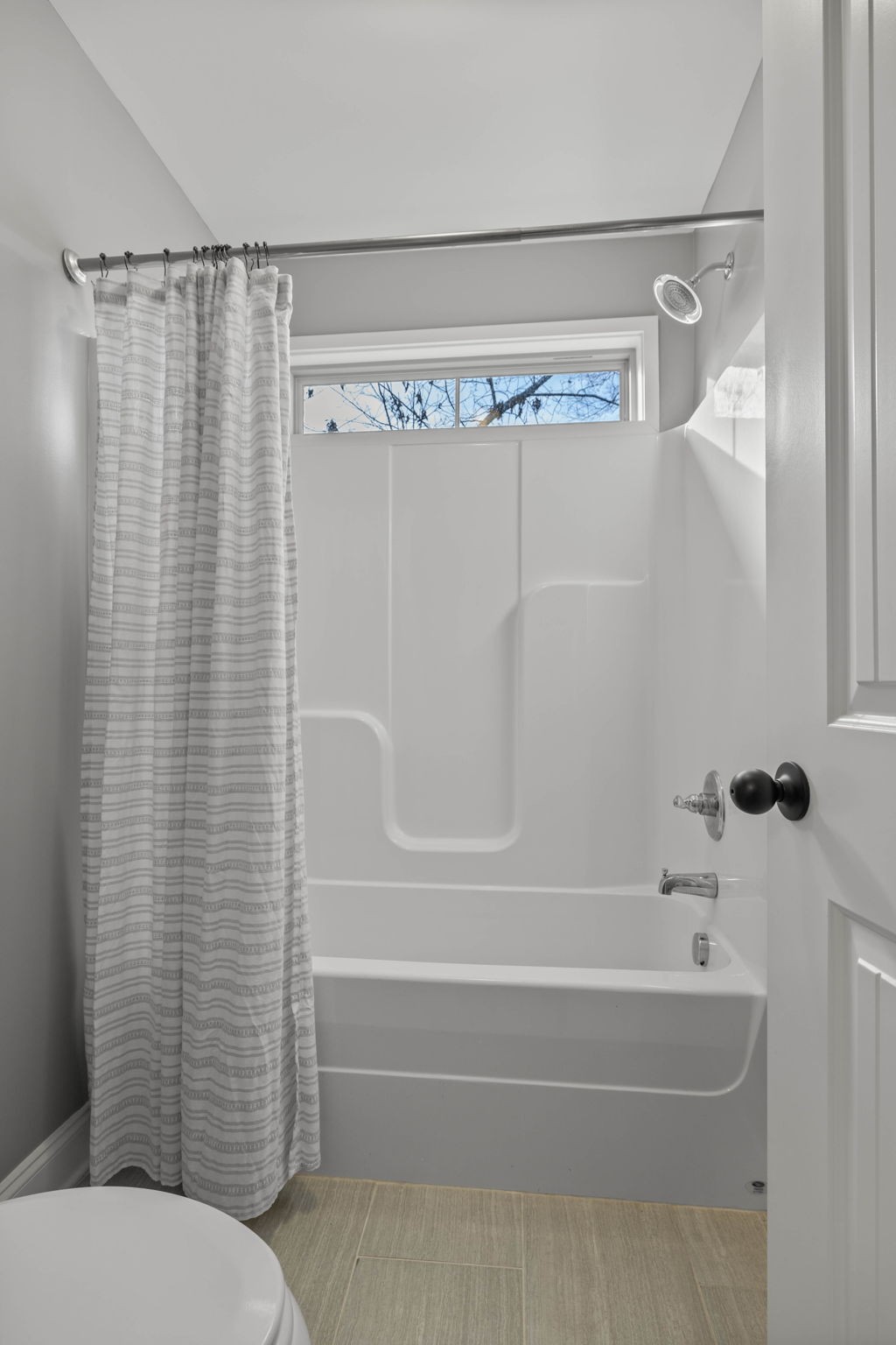 312 Cedar Street Lebanon, TN 37087 - Photo 40 of 69 a bathroom with a shower and a toilet