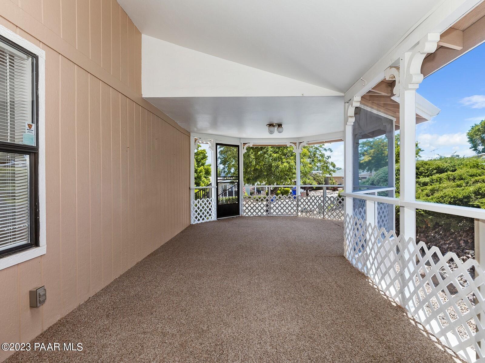 3166 Shiloh Road Prescott, AZ 86301 - Photo 3 of 29 003_Front Entry Screened In Patio