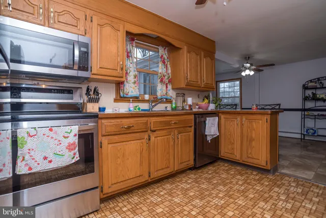 a bathroom with a sink and a shower