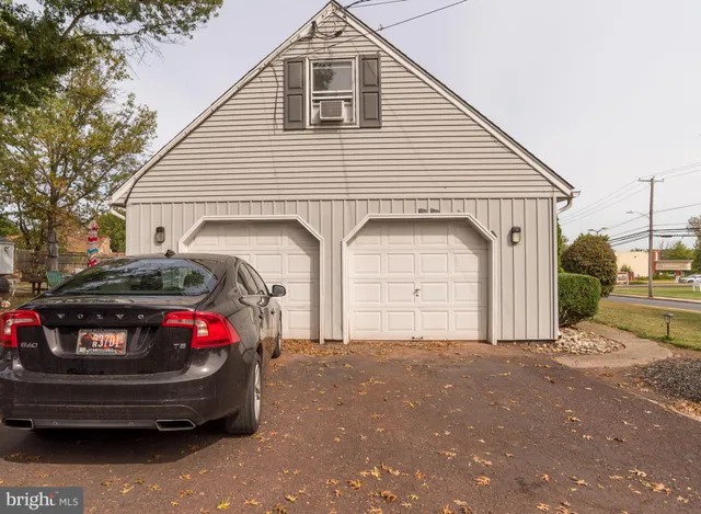 a view of street with parked cars