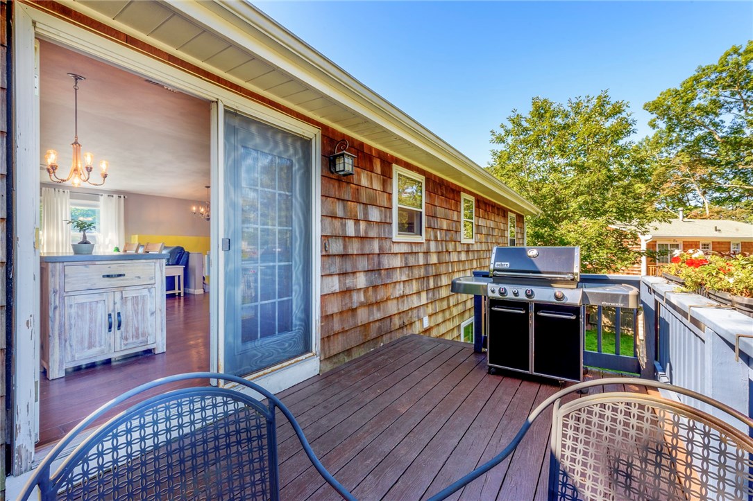 25 Beaver Road Barrington, RI 02806 - Photo 16 of 21 Sliders out to deck from main level