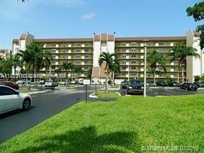 3100 West Rolling Hills Circle, Unit 101 Davie, FL 33328 - Photo 1 of 12 a view of a city