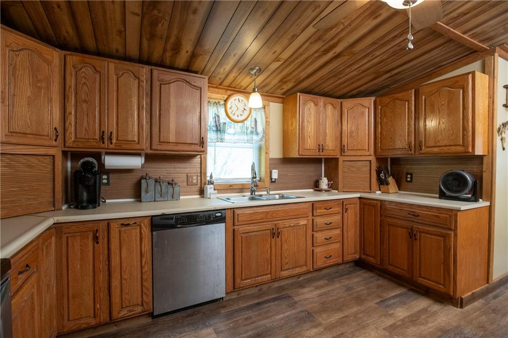 9133 South Watson Run Road Meadville, PA 16335 - Photo 7 of 45 a kitchen with stainless steel appliances granite countertop a sink a stove and cabinets