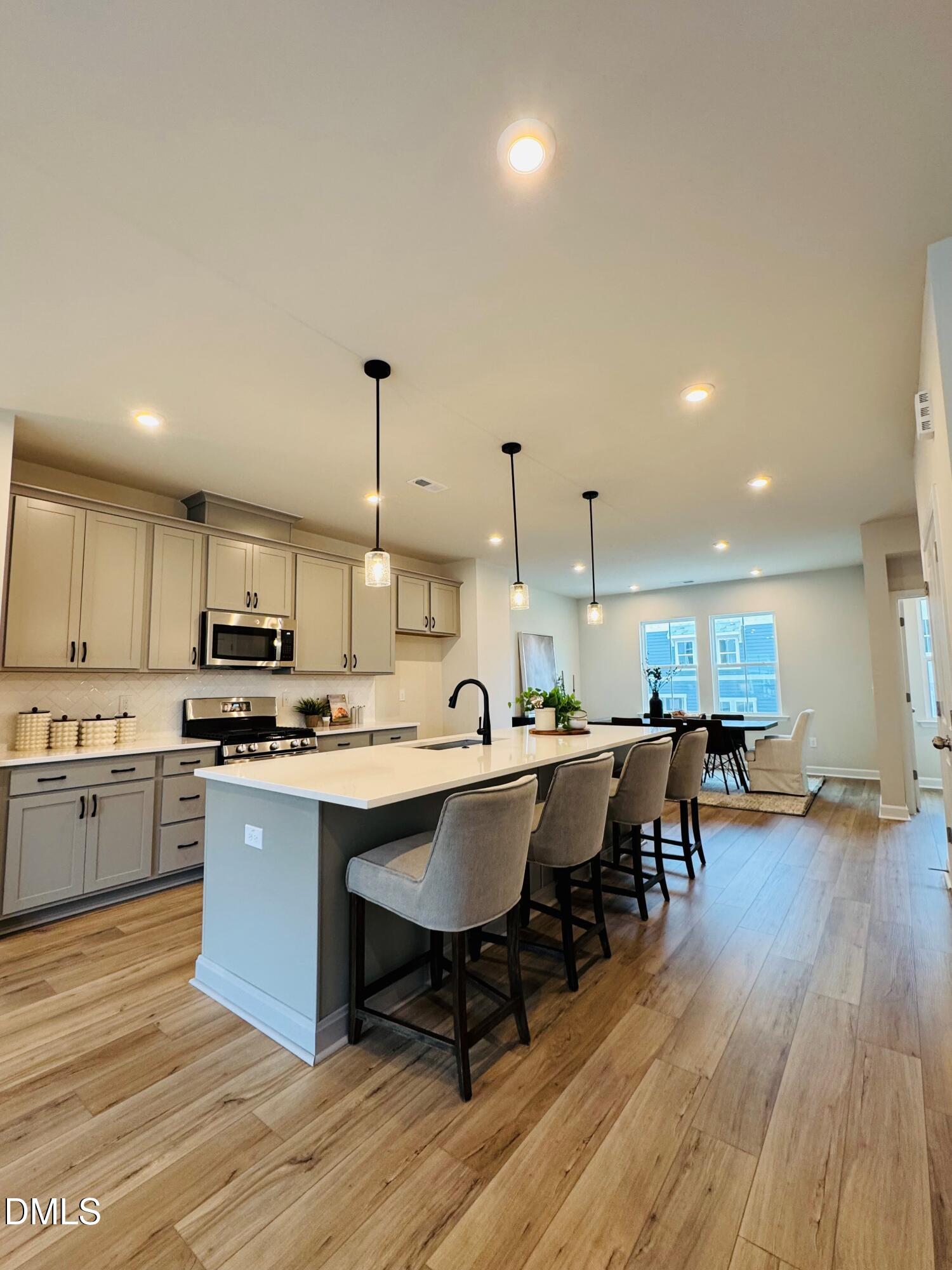 802 Hyperion Alley Wake Forest, NC 27587 - Photo 3 of 67 Holden 50 kitchen and dining area