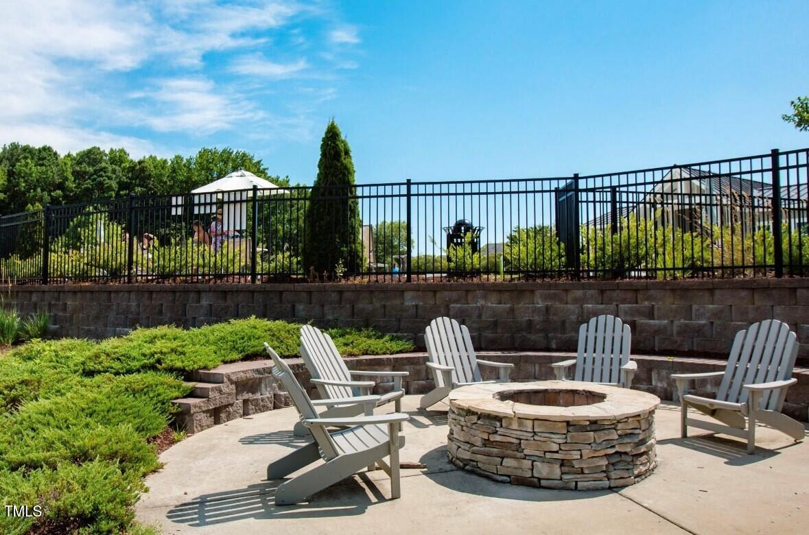 802 Hyperion Alley Wake Forest, NC 27587 - Photo 36 of 64 Mews fire pit by the pool