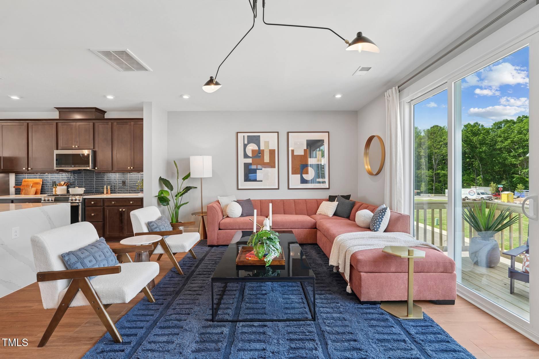 802 Hyperion Alley Wake Forest, NC 27587 - Photo 63 of 67 Twinleaf Townes 8_Holden Model_Living Ro