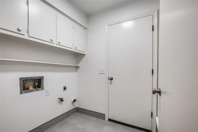 a view of cabinets and window